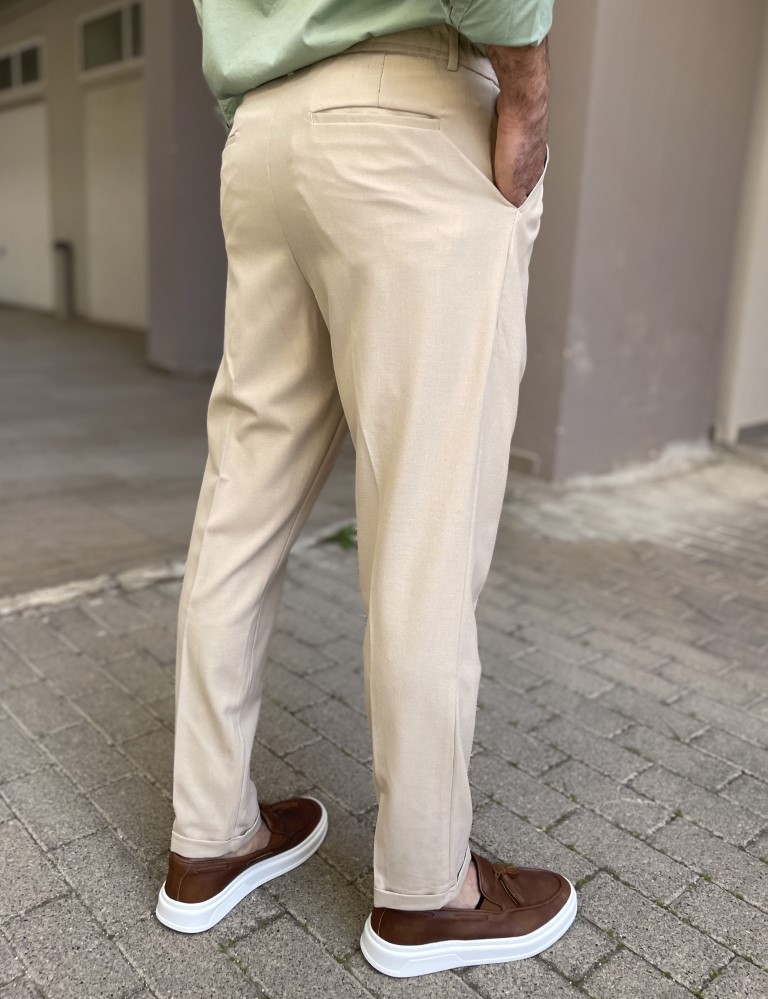 Ανδρικό μπεζ υφασμάτινο παντελόνι με πιέτες και λάστιχο στην μέση FCL00495M φωτογραφία